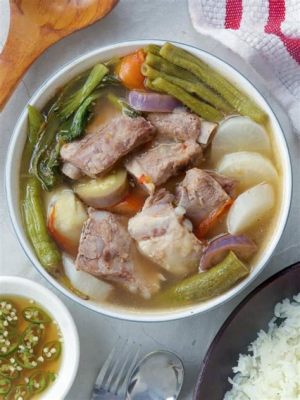  Sinigang na Baboy: A Tangy and Refreshing Symphony of Sourness and Savory Flavors